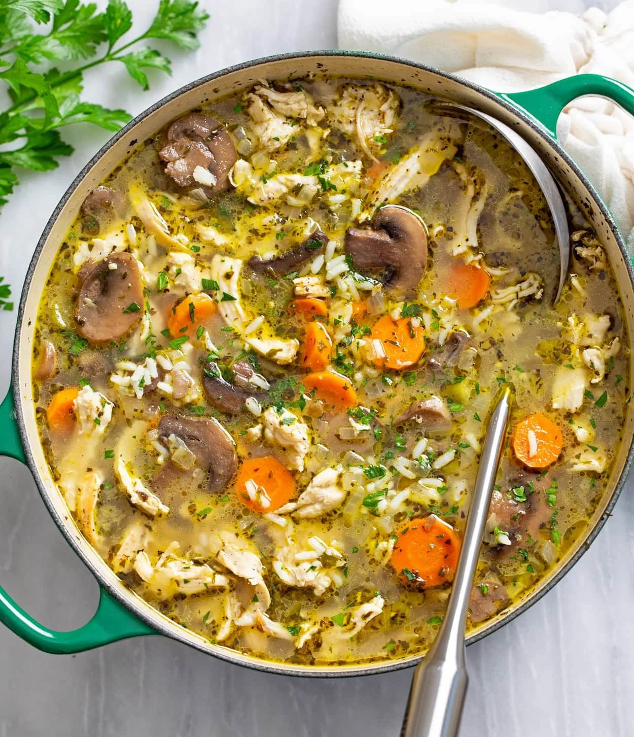 Bowl of Chicken Mushroom Soup with herbs and spices