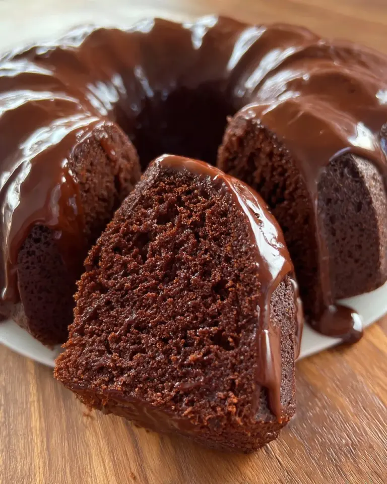 Easy moist chocolate cake recipe with rich chocolate frosting and toppings