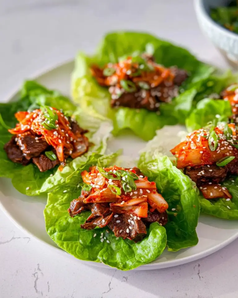 Korean beef lettuce wraps with fresh vegetables and savory sauce