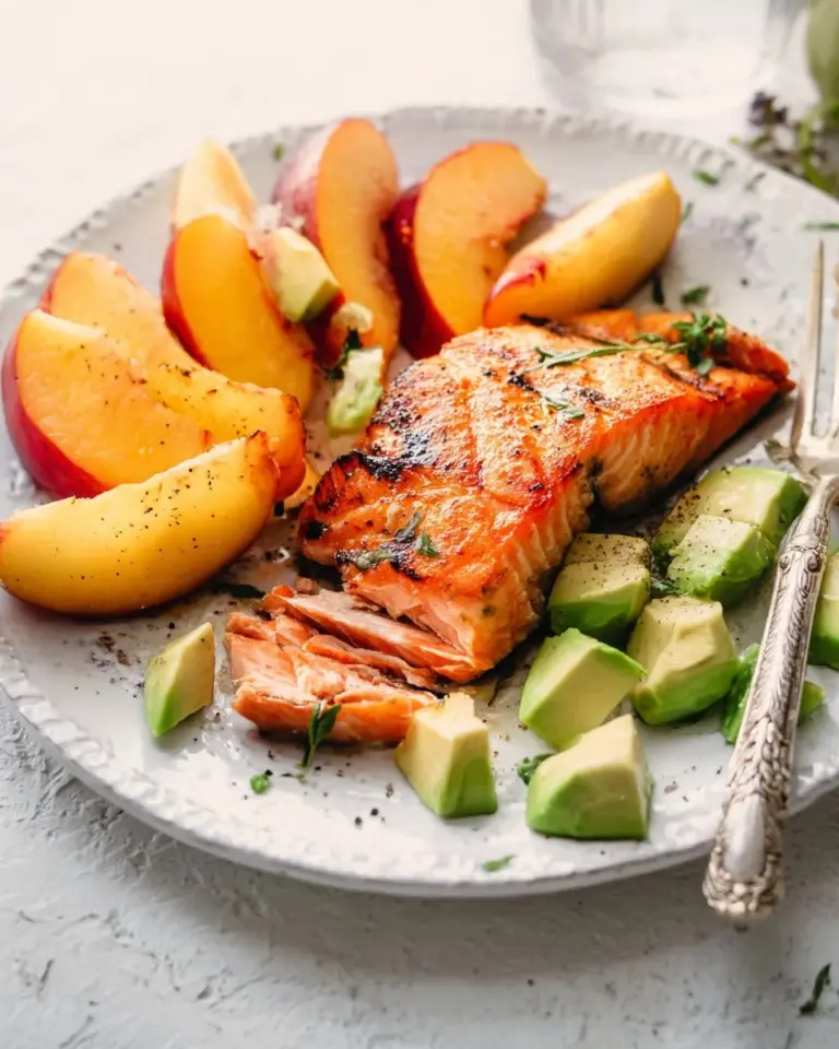 Foolproof grilled salmon recipe that is moist and flaky, served on a plate.