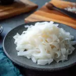 Homemade fresh rice noodles (ho fun) ready for a delicious meal