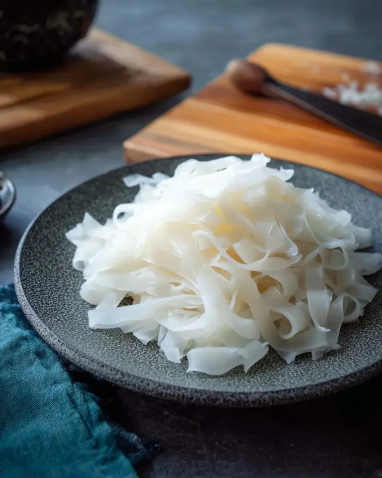 Homemade fresh rice noodles (ho fun) ready for a delicious meal