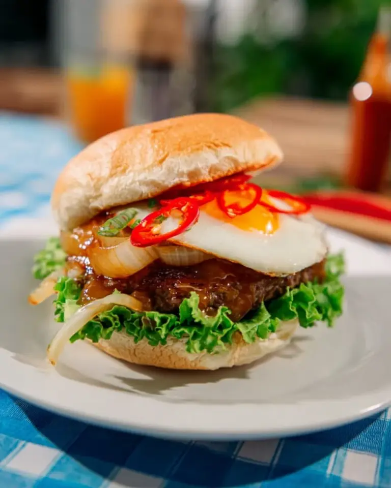 Delicious Massaman Curry Burger showcasing rich flavors and vibrant ingredients.