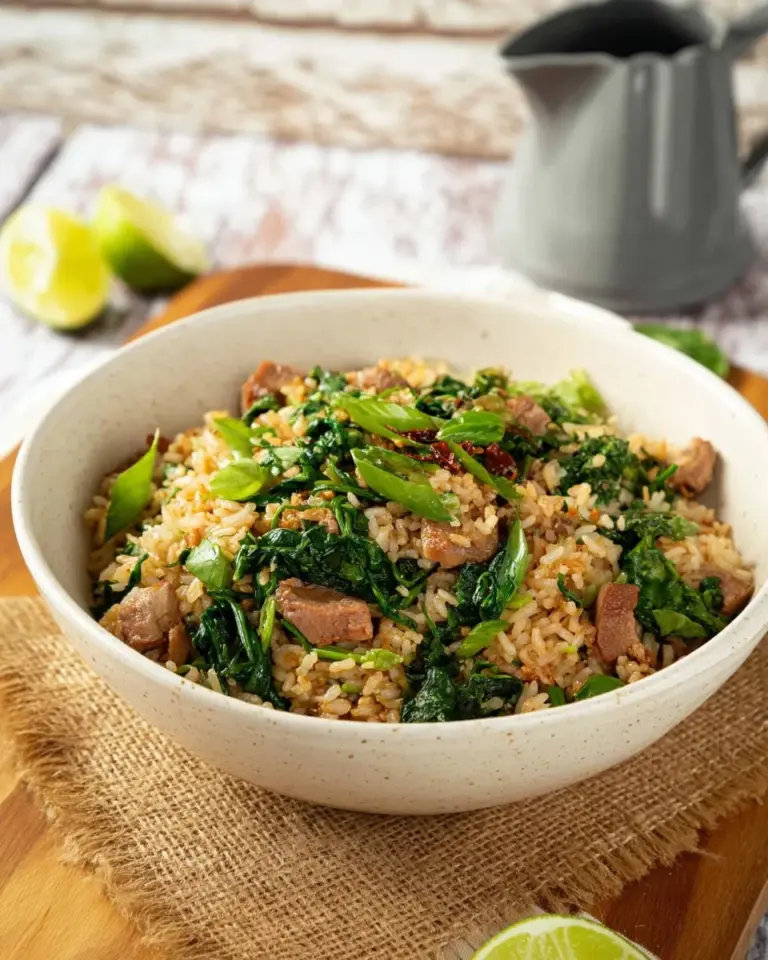 Plate of Thai Pork Fried Rice with vibrant vegetables and tender meat
