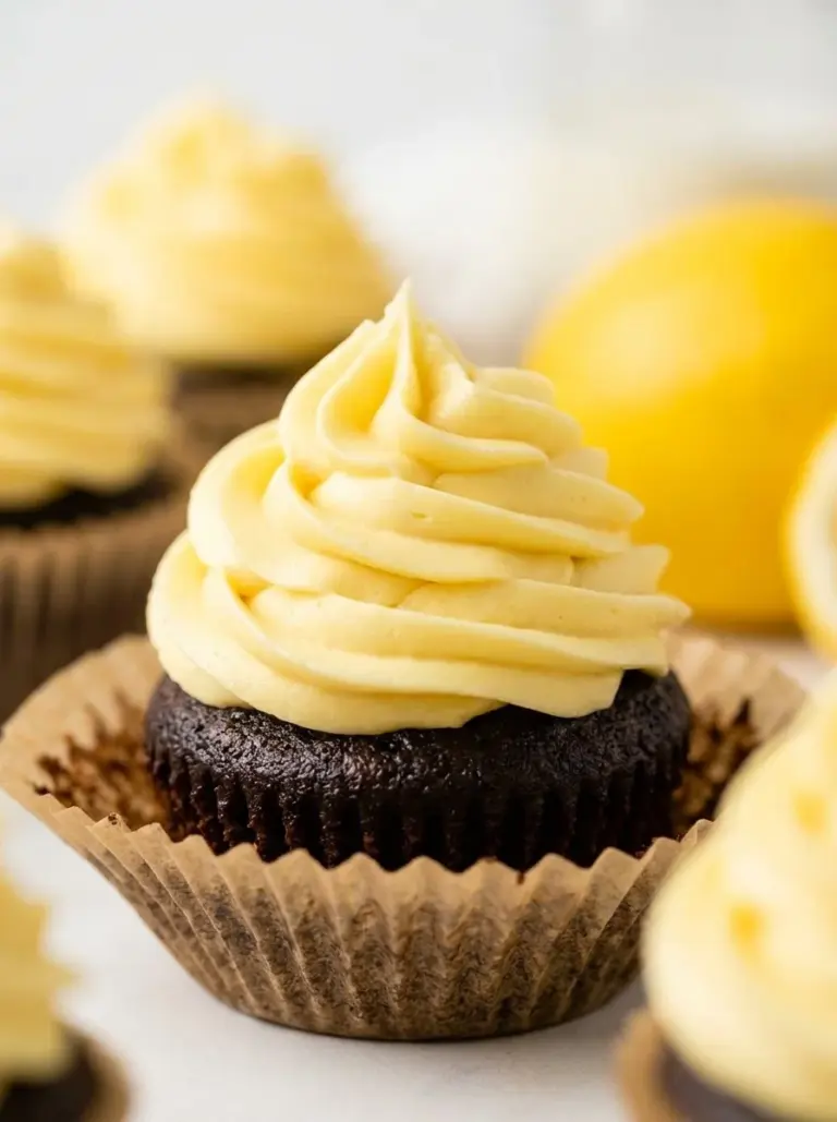 Delicious lemon cream cheese frosting spread on a cake